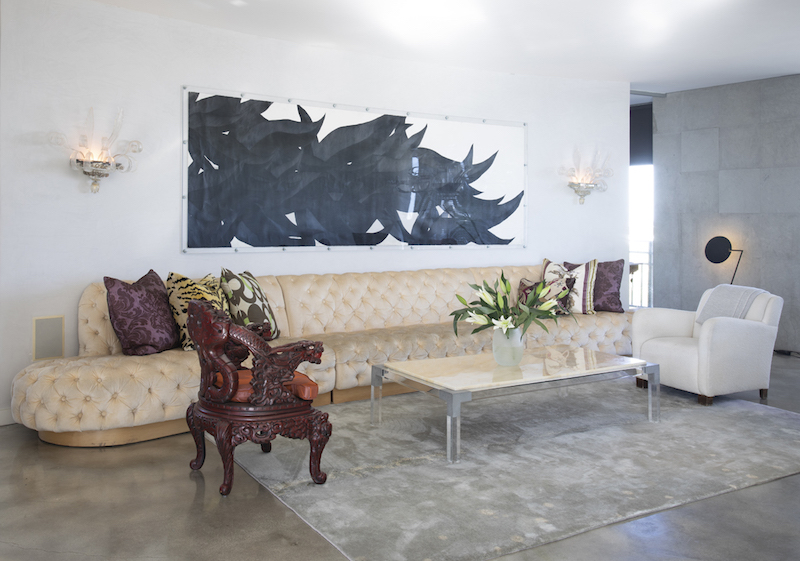 Kevin Gray's Apartment, Palm Bay Tower, 16′ custom designed tufted leather sofa, Photo by Robin Hill